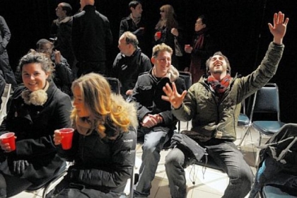 Corey Cook, center left, of Lawrenceville, and Matthew Spangler of the South Side, right, share the fun at the group's Gallery Crawl performance.