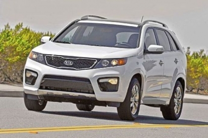 The 2013 Kia Sorento offers families seven SUV seats on a budget.