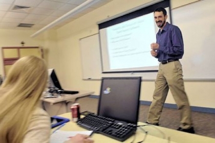 Carlow associate professor Cory Maloney, teaching about open source computer programming, uses a lower-cost, customized e-textbook for his students.