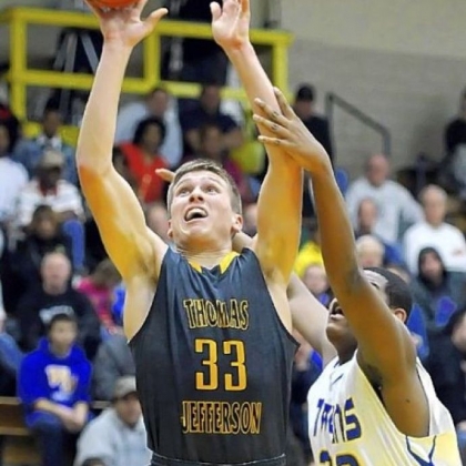 Thomas Jefferson's Chase Winovich scores despite defensive effort of  West Mifflin's Cleave Randolph.