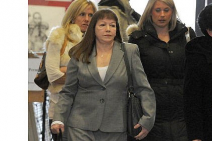Forensic psychologist Alice Applegate, left in front, walks out of the Westmoreland County Courthouse during a lunch break Wednesday. She was testifying  for the defense.