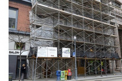 Restoration work is being done on the facades of buildings at 420 and 422 Wood St., Downtown.