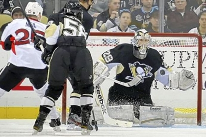 Marc-Andre Fleury makes one of his 27 saves in winning for the sixth time this season.