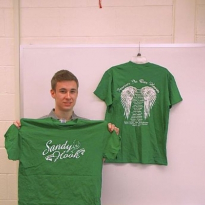 Sales of Noah Sims' T-shirts will benefit Sandy Hook Elementary School in Connecticut.