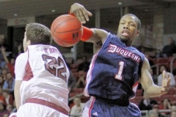 Dukes hold on for first conference win