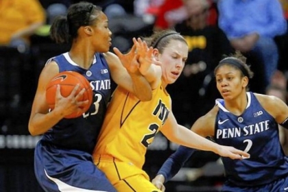 Iowa guard Samantha Logic, center, puts pressure on Penn State forward Ariel Edwards Thursday at Carver-Hawkeye Arena in Iowa City, Iowa.