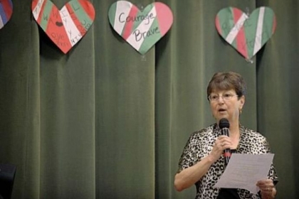 Susanne Pearson Evans speaks Thursday to students at Minadeo School in Squirrel Hill and via Skype to students at Minadeo School in Montagano, Italy. Mrs. Evans was injured in a traffic accident in 1954 in which 15-year-old John Minadeo was killed while saving several students. The schools in Pittsburgh and Italy are named after the young hero.