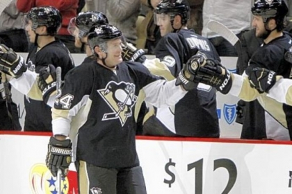 Matt Cooke celebrates his second-period goal against the Capitals in a win earlier this season.