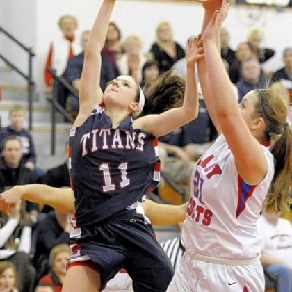 Shaler sophomore Lizzie Kline reaches for a rebound against Chartiers Valley's Kristin McGeough.