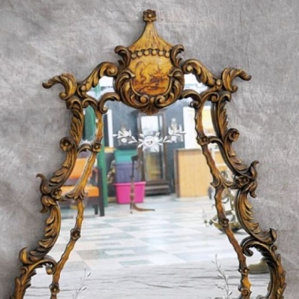 A Chippendale style chinoiserie gesso mirror with cut glass.