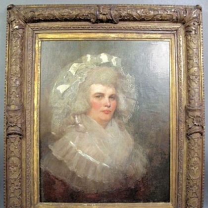 Portrait of a lady with lace hat.