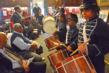 Marshall Anderson, 13, right, and other members of Soldiers & Sailors 6th Regiment USCT Drum Corps, perform during the third annual African American Heritage Celebration at Soldiers & Sailors Memorial Hall & Museum in Oakland on Saturday.