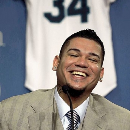 Why is this man smiling? Well, Felix Hernandez has 175 million reasons after signing a new contract with the Mariners.