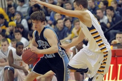 Seneca Valley's T.J. Holl, left, dribbles past Central Catholic's Joe Marchione in a Class AAAA first-round game Saturday. Seneca Valley won, 72-41.