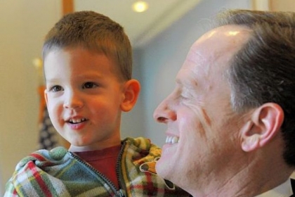 Sen. Pat Toomey stops in his office between meetings Tuesday to greet his son Duncan, 2.
