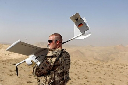 A German Bundeswehr holds an EMT Aladin airborne reconnaissance drone for close area imaging during a regular patrol near Mazar-e-Sharif, Afghanistan.