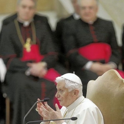 Pope Benedict XVI talks during an audience the with Roman clergy, in the Paul VI Hall at the Vatican, Thursday, Feb. 14, 2013.