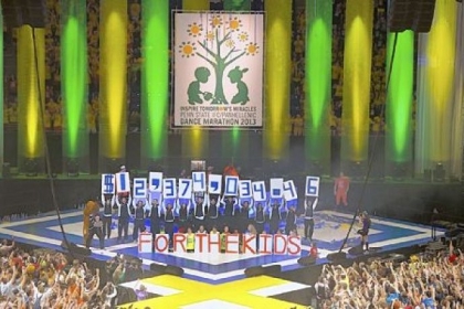 THON 2013 volunteers display the total of more than $12.4 million  raised for the Four Diamonds Fund at Sunday's end of the 46-hour event