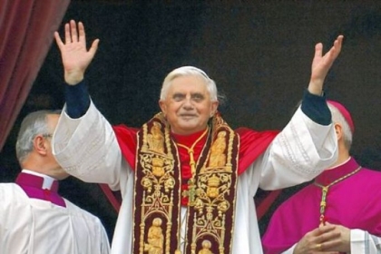 Pope Benedict XVI greets the crowd from the central balcony of St. Peter's Basilica moments after being elected on April 19, 2005, at the Vatican.