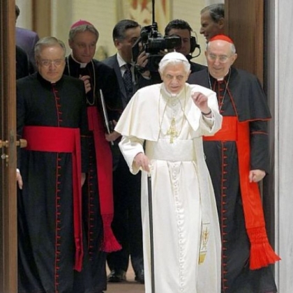 Pope Benedict XVI arrives for an audience Thursday with the Roman clergy in the Paul VI Hall at the Vatican.