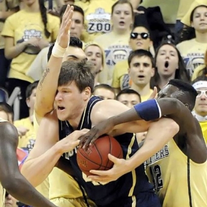 Pitt's Steven Adams and Talib Zanna fight for the ball against Notre Dame's Jack Cooley in the first half Monday at Petersen Events Center.