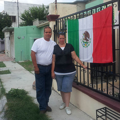 Jose Pedro Verde-Rodriguez and Andria Verde stand near their home in Matamoros, Mexico, in September.