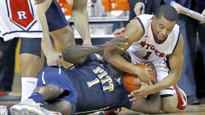 Tray Woodall tries to hold onto the ball as Jerome Seagears tries to make a steal in the second half.