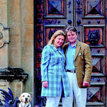 The Countess Fiona Carnarvon with the eighth Earl of Carnarvon George Herbert in front of Highclere Castle.