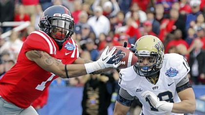 Mississippi receiver Randall Mackey, left, snags a touchdown pass in front of Jarred Holley for a 14-0 lead.