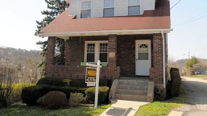 The three-bedroom Colonial at 307 George St. in Turtle Creek eventually sold for $70,000 right before Christmas to the first person who saw it when it went on the market earlier in 2012.