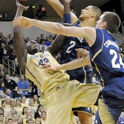 Notre Dame's Zach Auguste blocks a shot by Pitt's Talib Zanna in the first half of the Panthers' loss to the Irish Monday night at Petersen Events Center.