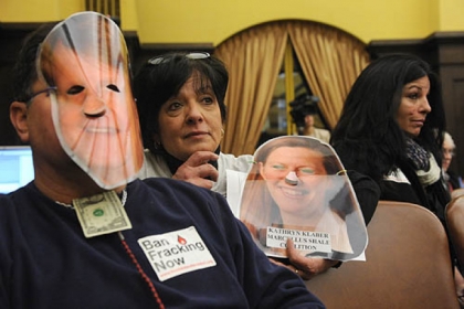 From left Kenneth Weir and his wife, Loretta Weir, of Lincoln Place, and Mary Persuit of Sewickley listen as county council begins discussion on the ordinance allowing the lease of  mineral rights and drilling at the Pittsburgh International Airport. County council voted for the ordinance.