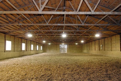 The property includes an indoor riding arena.