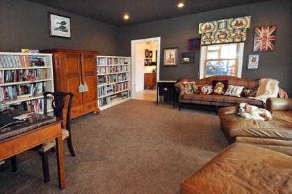 The family room ceiling is painted the same "otter" gray as the walls.