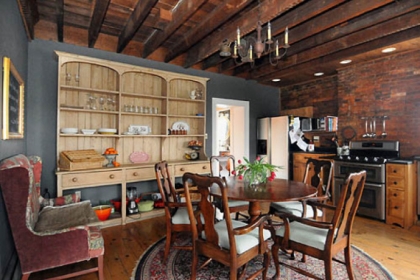 The large antique cupboard offers plenty of storage and will be staying with the house.