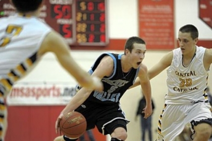 Seneca Valley's John Petrishen drives to the basket around Central Catholic's Joe Marchione during a  WPIAL Class AAAA playoff game last Saturday at North Hills.