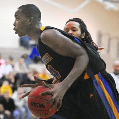 Westinghouse's Affani Brown drives to the basket against Brashear during a City League semifinal game.