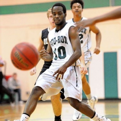 Sto-Rox's Tonyea Curry dishes the ball off to a teammate during a game against Quaker Valley earlier this season.