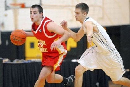 Dan Savulchak, driving past Mercyhurst's Derick Post, averages 20.9 points per game.