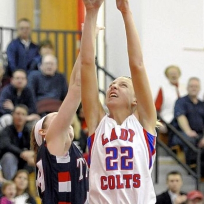 Char Valley's Kristina Coyne reaches for a rebound against Shaler's Abby Conrad.