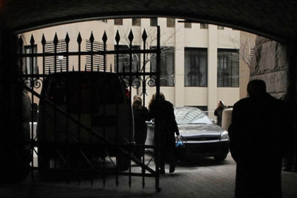 Joan Orie Melvin and Janine Orie leave  the Allegheny County Courthouse today via the sheriff's firearm permit entrance.