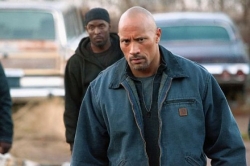 Movie review: Even The Rock's heroics can't save 'Snitch' from an overdose of simplicity