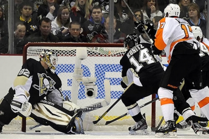 Philadelphia's Wayne Simmonds scores in Wednesday's game on Penguins goaltender Tomas Vokoun. Will the home losing woes be cured in time for tonight's visit by Florida?