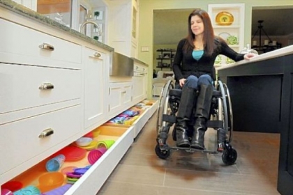 Allison Pileggi can open kick-plate drawers along the floor with the touch of a hand or toe.