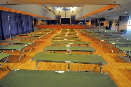 Cots are set up for students in the ballroom of the Duquesne Union.