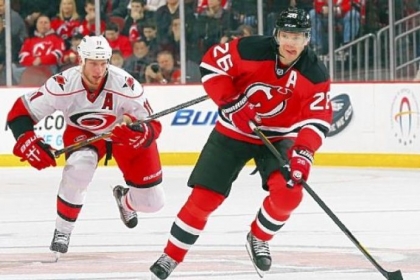 Former Penguin Jordan Staal, now with the Carolina Hurricanes, chases down Patrik Elias of the New Jersey Devils.