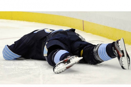 The Penguins' Evgeni Malkin lays on the ice after Panthers defenseman Erik Gudbranson knocked him into the boards in the third period at Consol Energy Center Friday night.