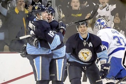 Beau Bennett is congratulated by Sidney Crosby after scoring his first NHL goal against the Lightning in the second period of the Penguins' win Sunday at Consol Energy Center.