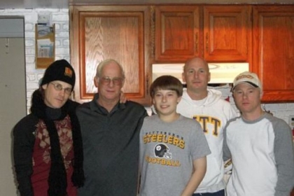 Clark Compston, 74, died at the Pittsburgh VA's University Drive hospital Nov. 14, 2011, after contracting Legionnaires' disease. Mr. Compston, second from left, is seen here with three of his sons and his grandson.