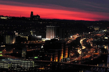 The sun begins to rise over the Parkway East.